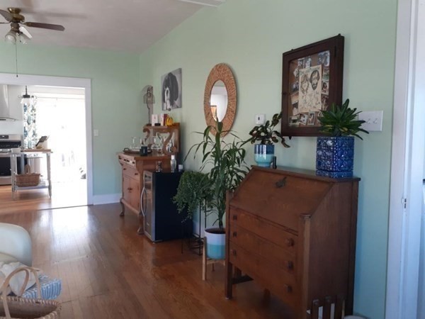 192 Thompson Road Webster, MA 01570 - Photo 11 of 32 a living room with furniture and a mirror