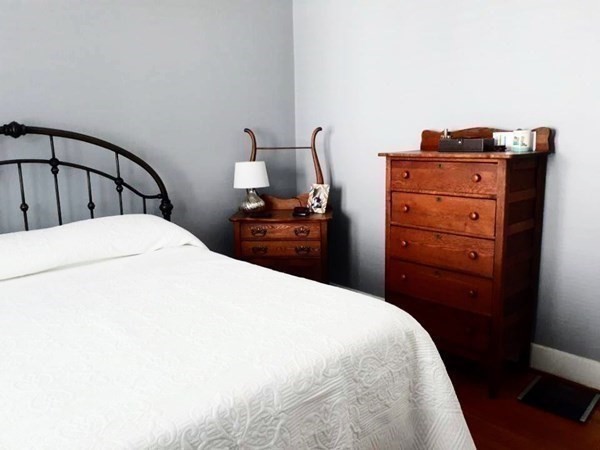 192 Thompson Road Webster, MA 01570 - Photo 13 of 32 a bedroom with a bed and a dresser