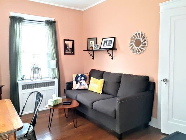 192 Thompson Road Webster, MA 01570 - Photo 15 of 32 a living room with furniture and a large window