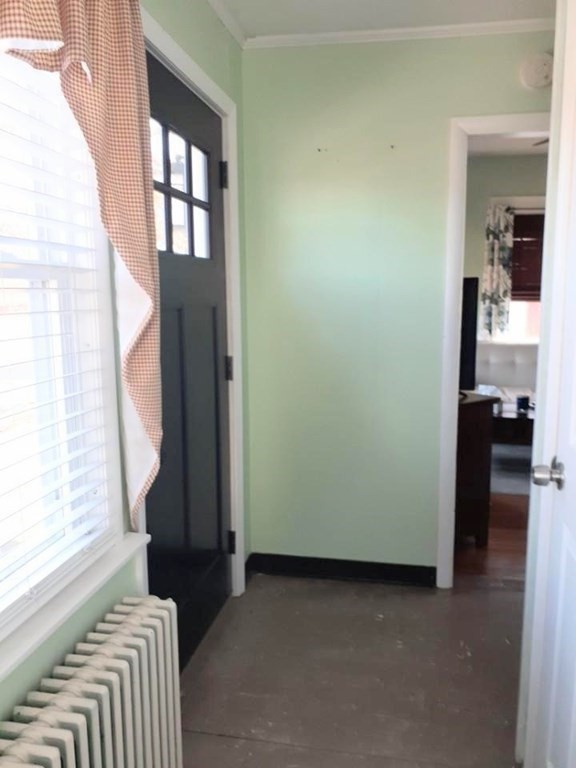 192 Thompson Road Webster, MA 01570 - Photo 20 of 32 a view of hallway with furniture and a window