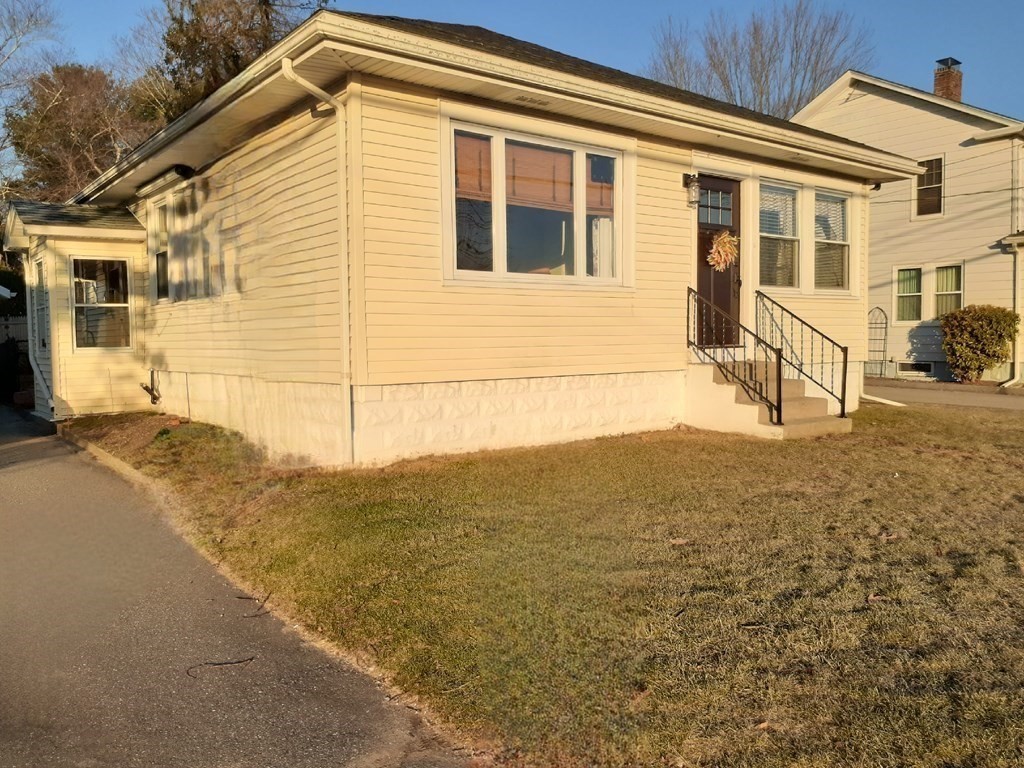 192 Thompson Road Webster, MA 01570 - Photo 31 of 32 a view of a house with backyard and sitting area