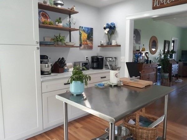192 Thompson Road Webster, MA 01570 - Photo 7 of 32 a kitchen with a table and chairs in it