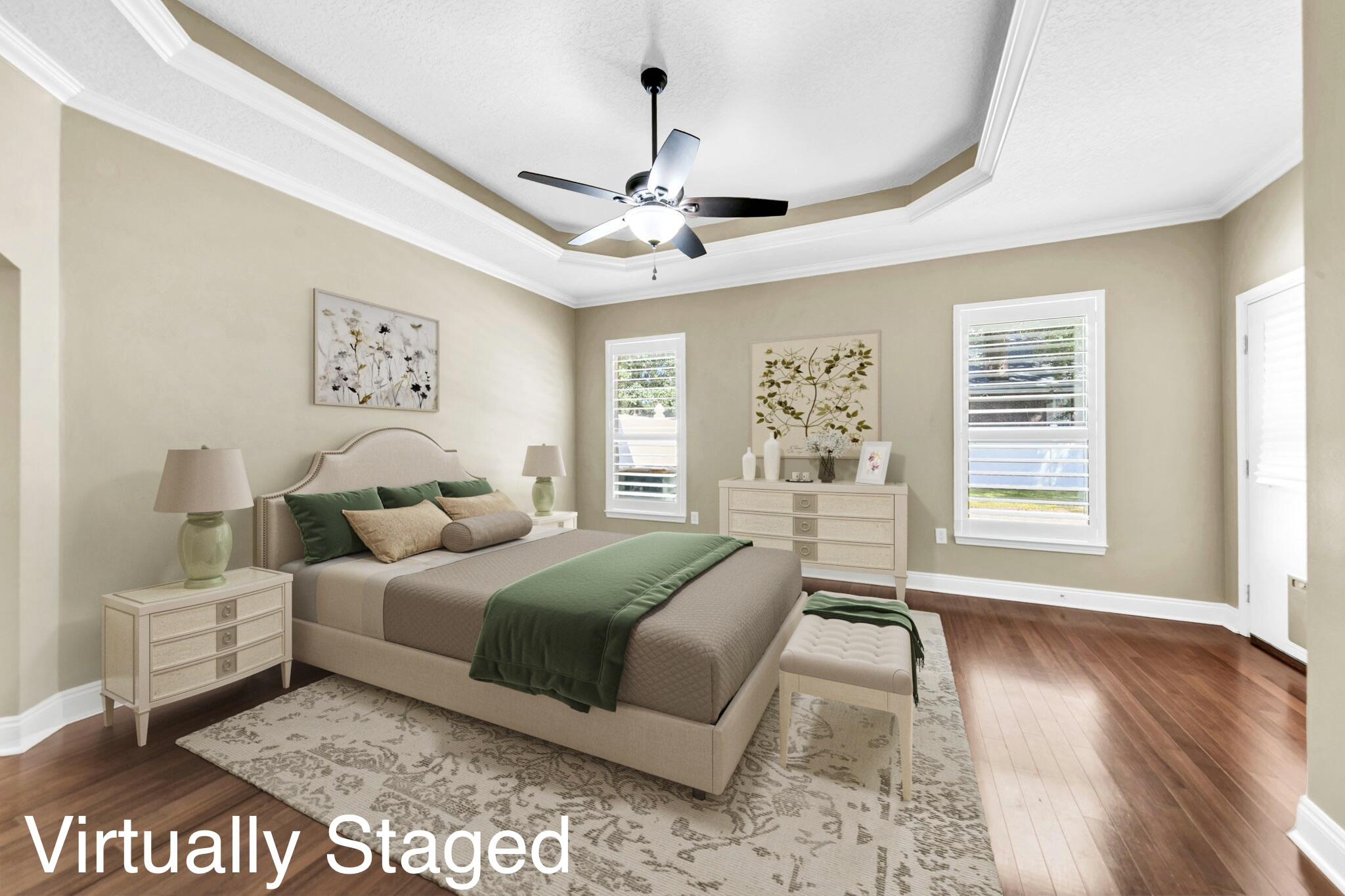 2623 Brodie Lane Crestview, FL 32536 - Photo 12 of 41 a spacious bedroom with a large bed and a window