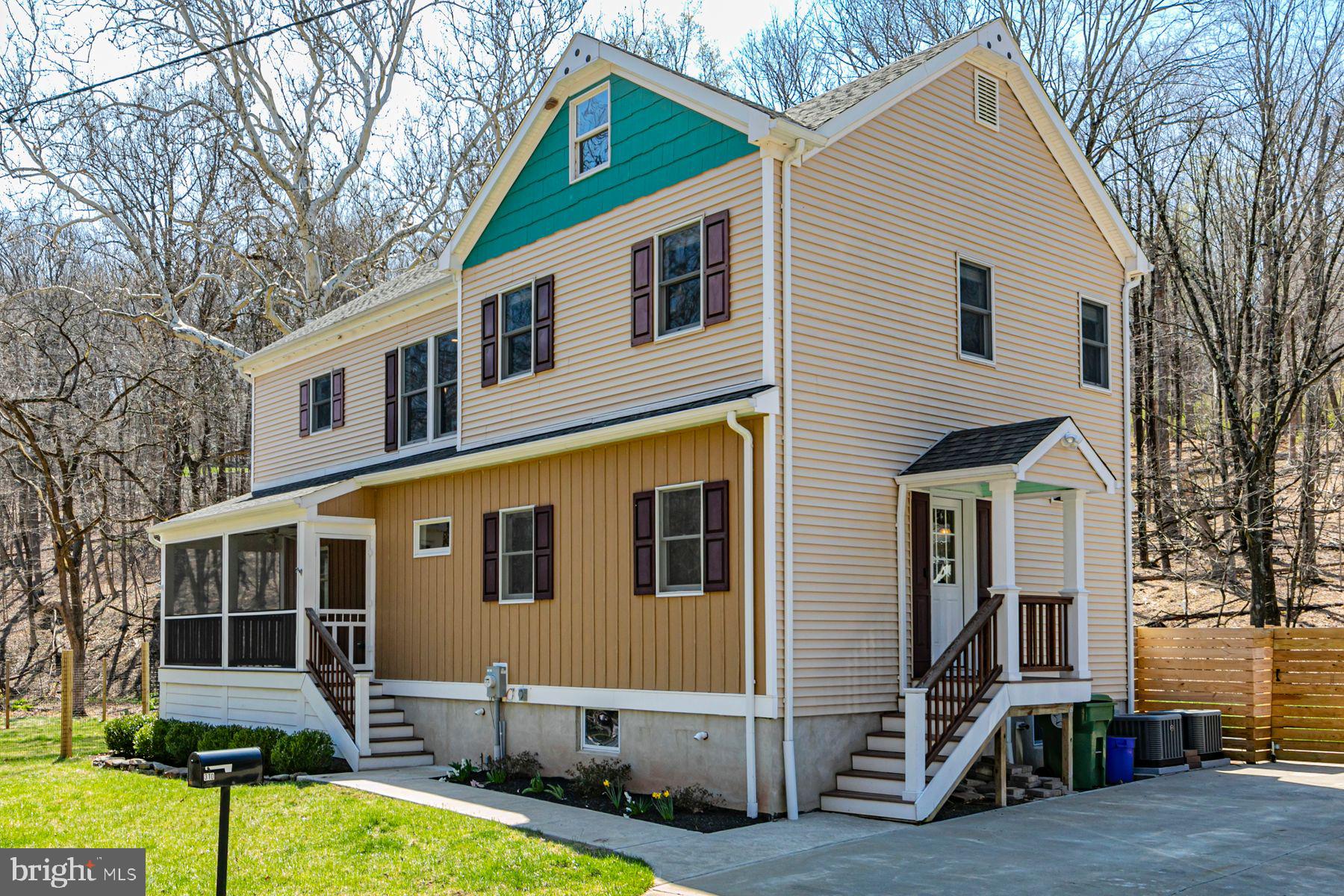 a front view of a house with yard