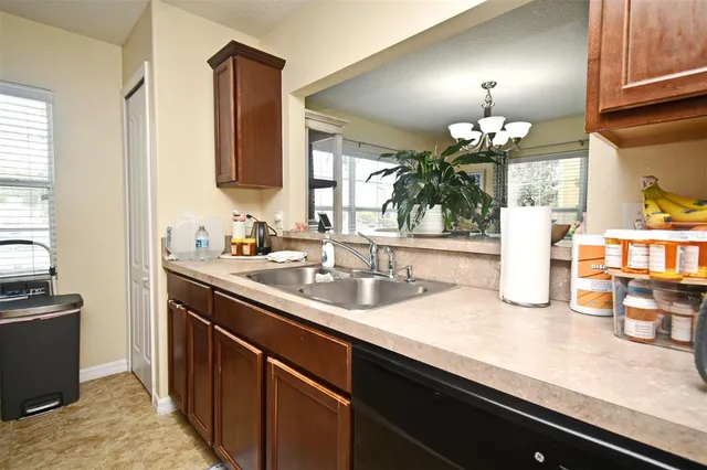 a bathroom with sink and mirror