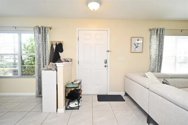 a room with a couch and a window