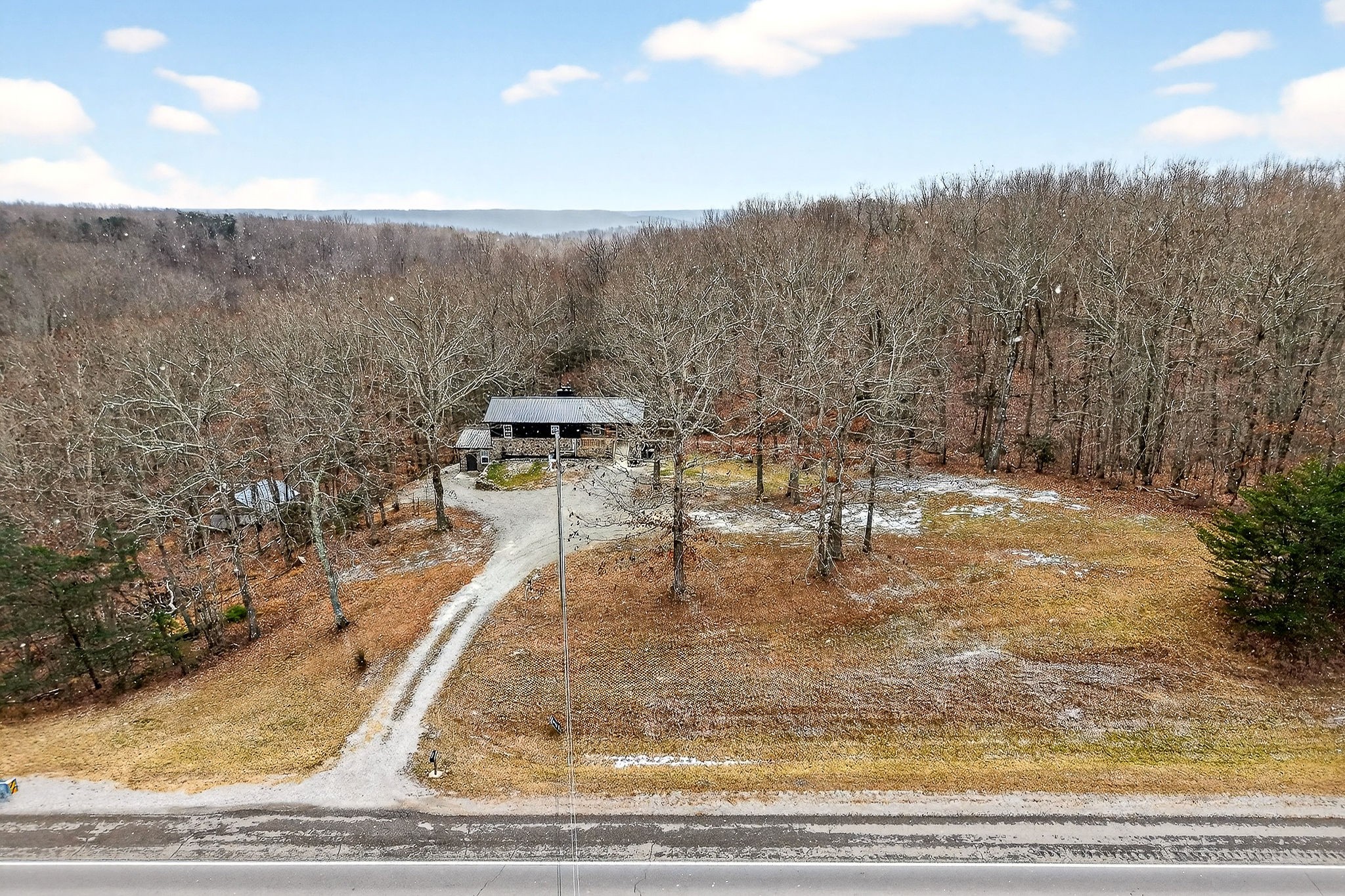 9388 Harrison Ferry Road McMinnville, TN 37110 - Photo 17 of 54 a view of a swimming pool with a yard