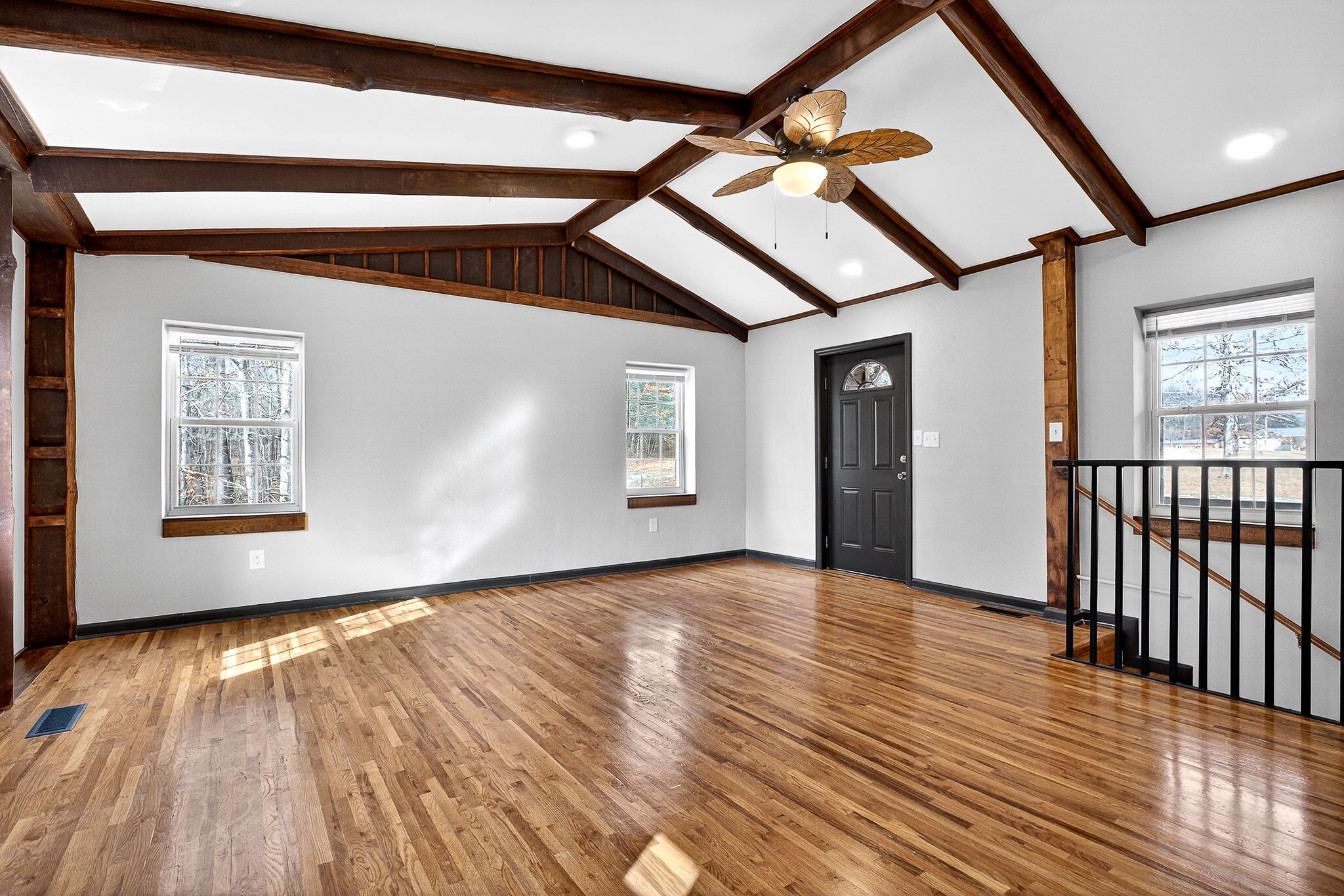 9388 Harrison Ferry Road McMinnville, TN 37110 - Photo 20 of 54 a view of an empty room with wooden floor and a window