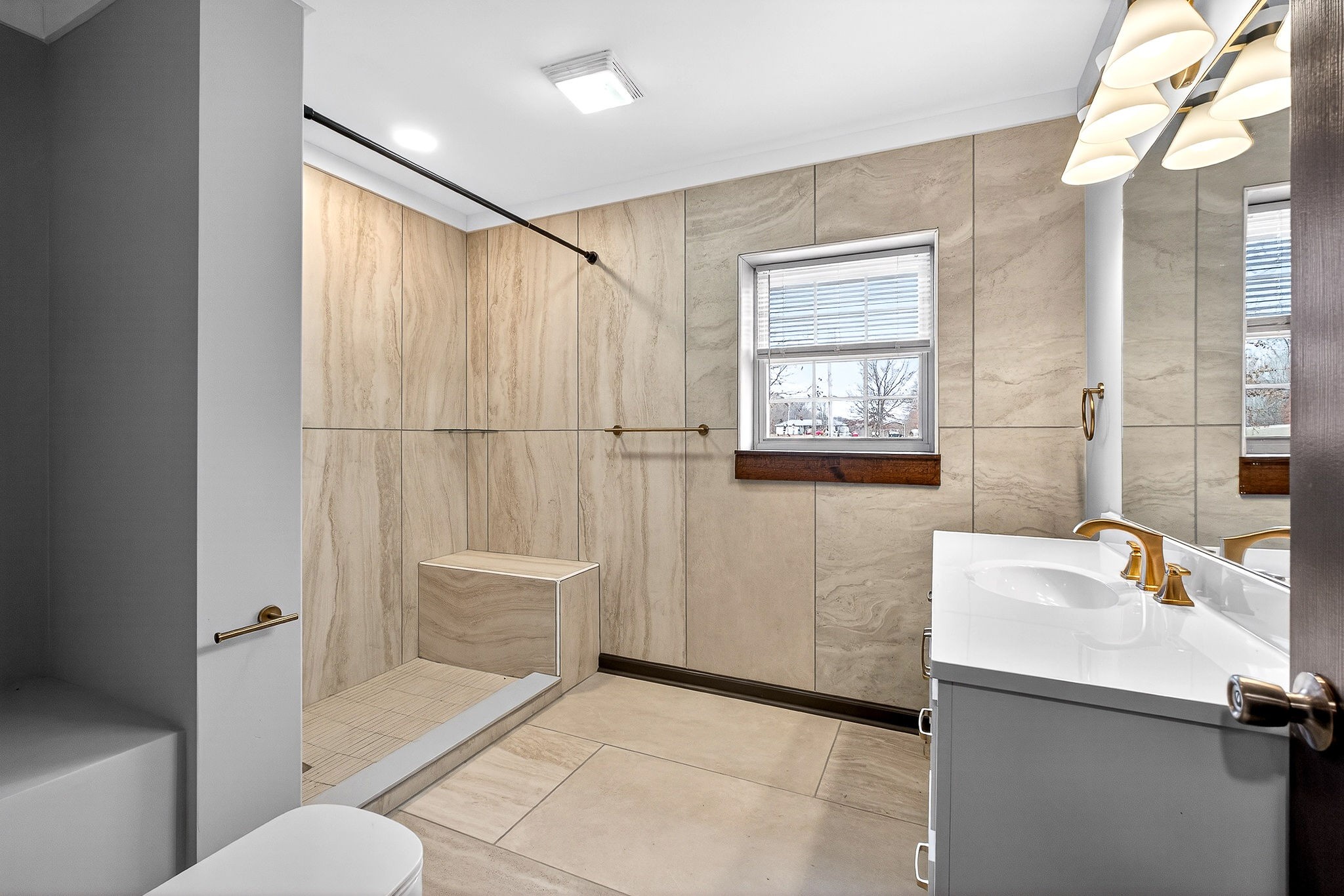 9388 Harrison Ferry Road McMinnville, TN 37110 - Photo 27 of 54 a bathroom with a sink and a bathtub