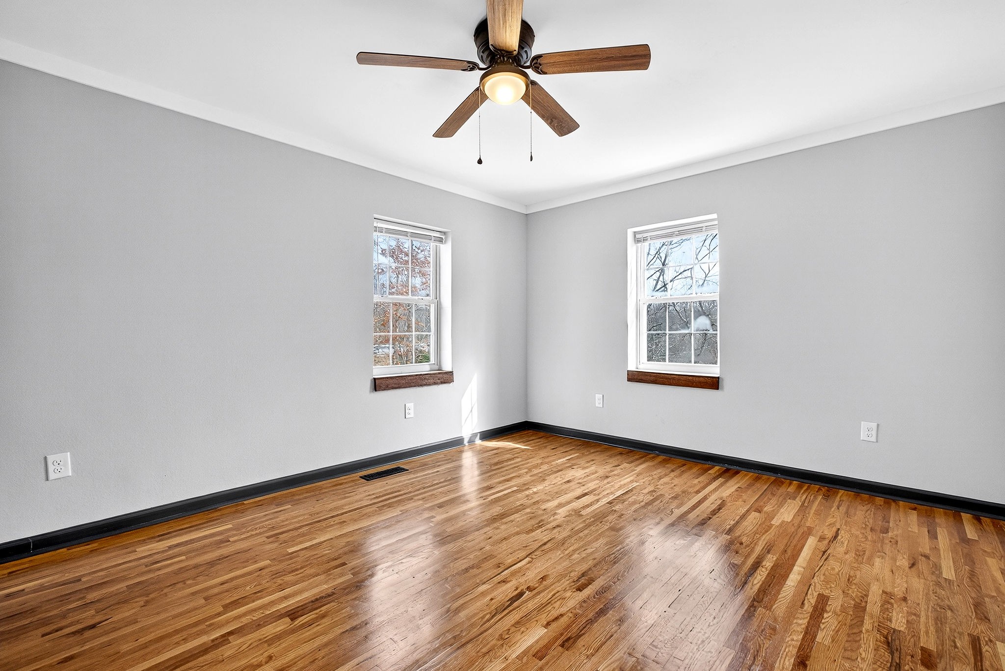 9388 Harrison Ferry Road McMinnville, TN 37110 - Photo 31 of 54 wooden floor in an empty room with a window