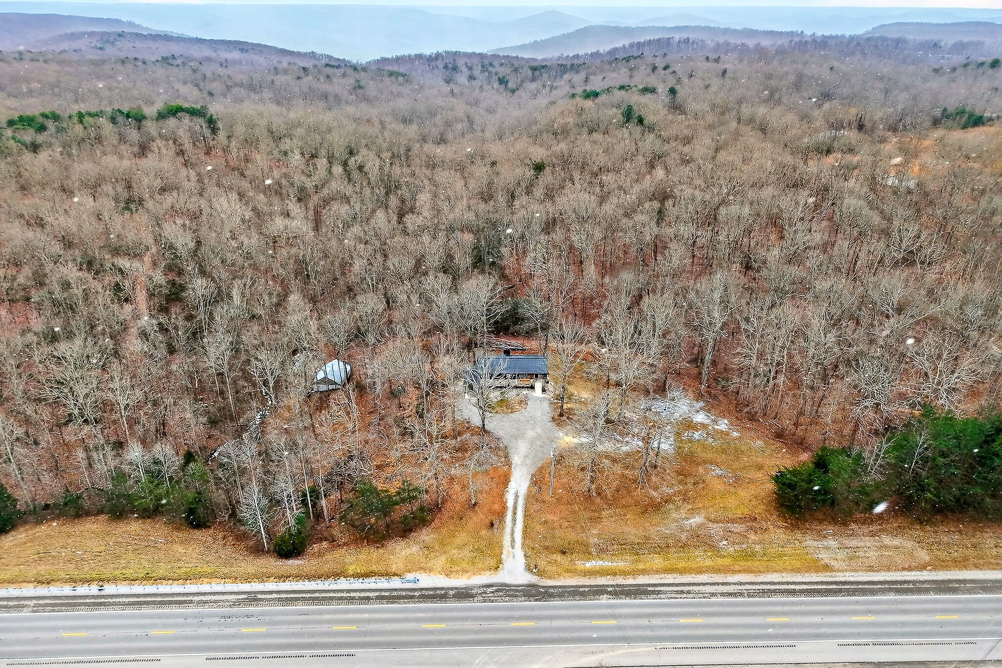 9388 Harrison Ferry Road McMinnville, TN 37110 - Photo 5 of 54 a view of a yard from a balcony