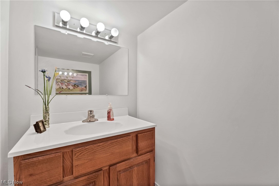 5740 Hauserman Road Parma, OH 44130 - Photo 34 of 35 Bathroom featuring vanity with extensive cabinet space