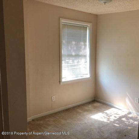 564 Jarrad Avenue Rifle, CO 81650 - Photo 3 of 8 a view of an empty room with a window