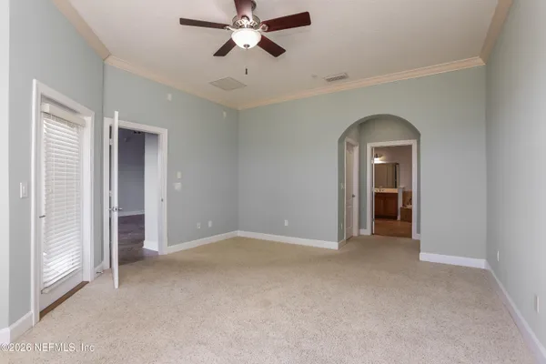 a view of an empty room and window