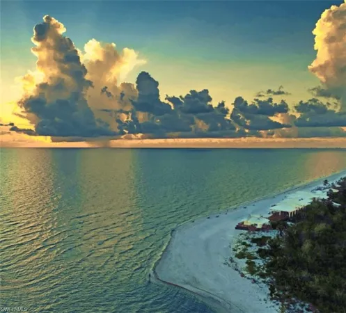 a view of an ocean and a building