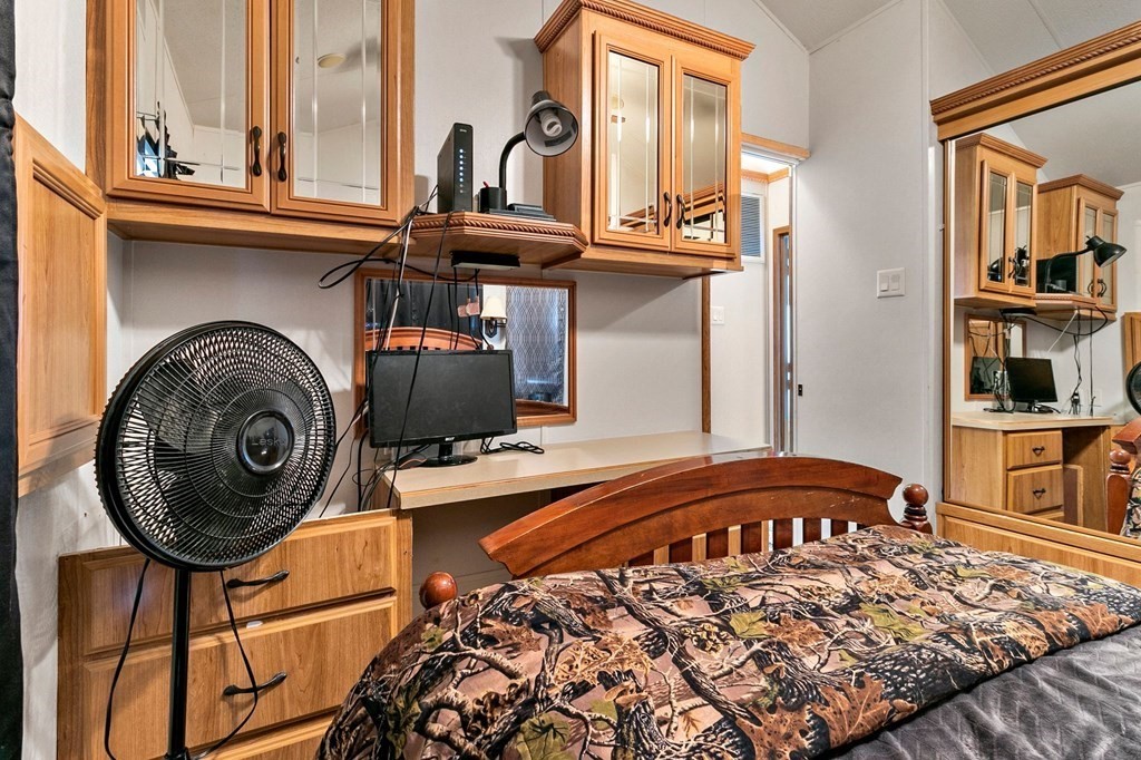 404 Southwick Road, Unit 9 Westfield, MA 01085 - Photo 24 of 30 a view of a bedroom with washer and dryer