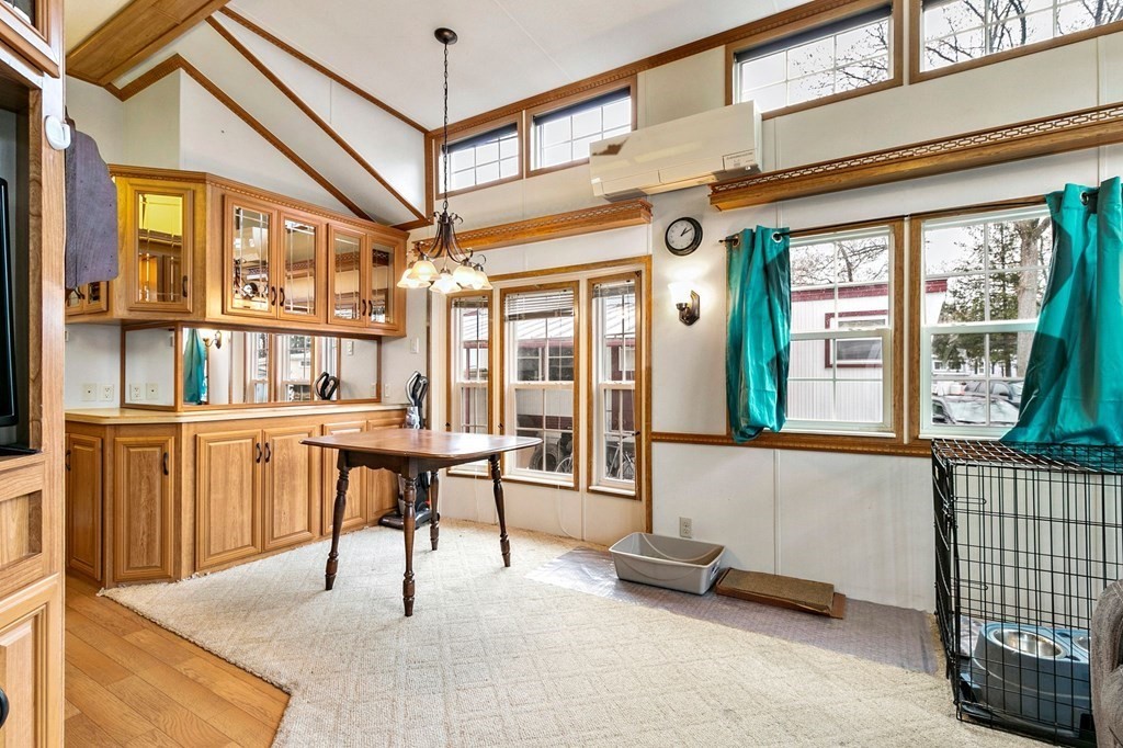 404 Southwick Road, Unit 9 Westfield, MA 01085 - Photo 10 of 30 a view of a livingroom with furniture and a large window