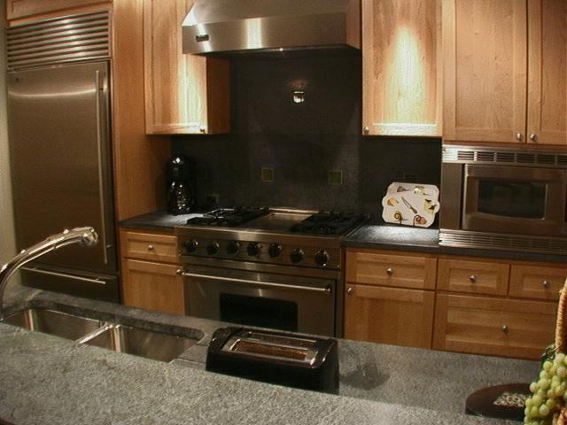 368 South Davis Street, Unit A7 Telluride, CO 81435 - Photo 3 of 9 a kitchen with a stove and a microwave