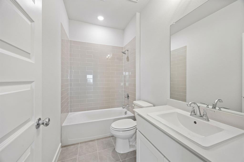 1477 Companero Street Haslet, TX 76052 - Photo 27 of 35 Bathroom in the Wimbledon home plan by Trophy Signature Homes – REPRESENTATIVE PHOTO