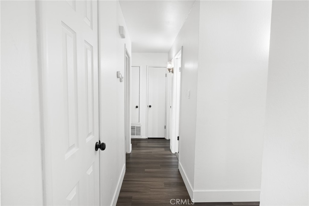 2618 Hoover Court Merced, CA 95340 - Photo 14 of 30 a view of a hallway with wooden floor