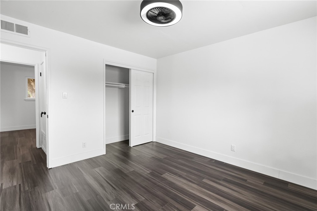 2618 Hoover Court Merced, CA 95340 - Photo 17 of 30 a view of empty room with wooden floor