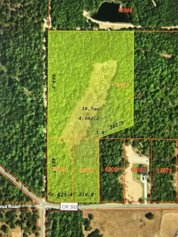 a view of a back yard from a balcony