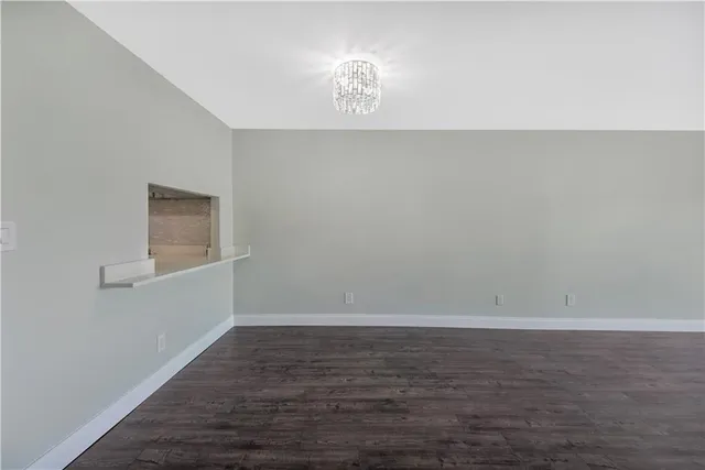 a view of an empty room and window