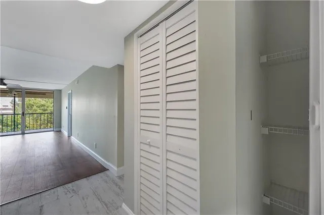 a view of hallway with windows