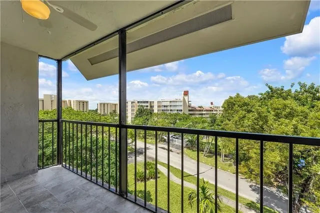 a view of a street from a balcony