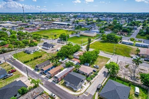 655 Southwest 5th Street Homestead, FL 33030 - Photo 21 of 23 an aerial view of a residential houses with outdoor space and swimming pool