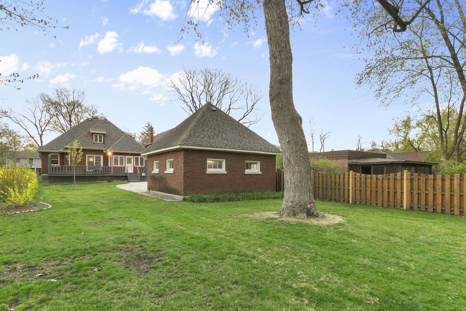 260 Bartram Road Riverside, IL 60546 - Photo 24 of 36 a front view of a house with garden