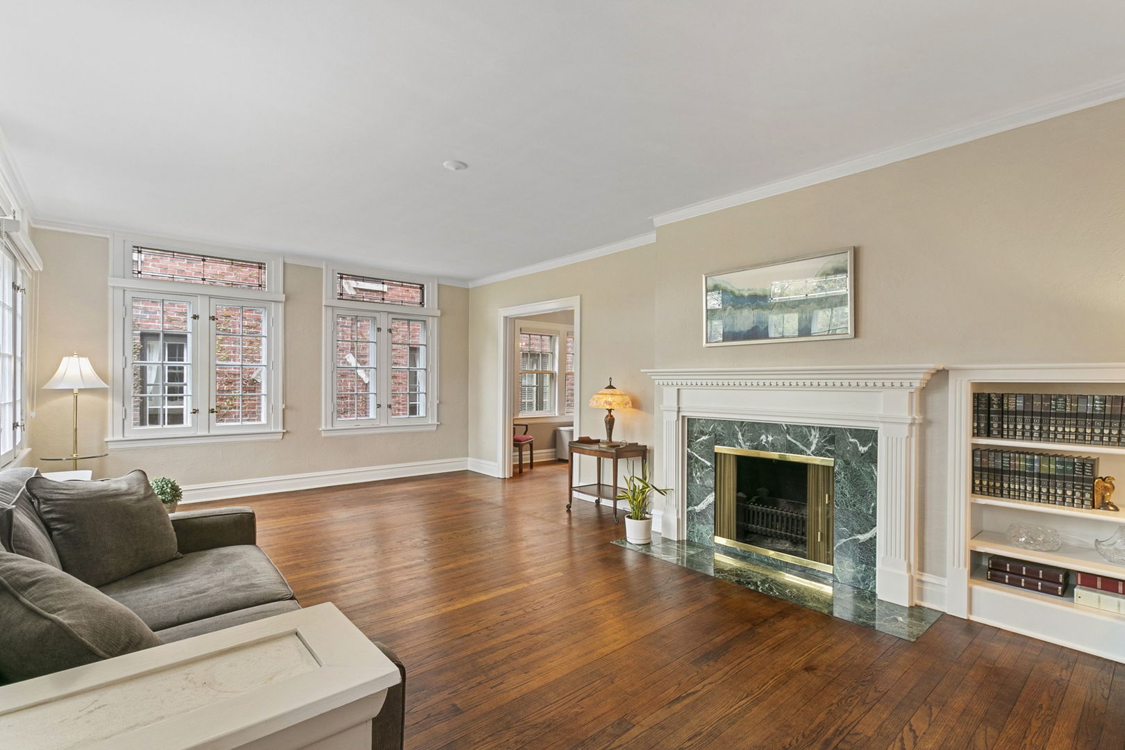 260 Bartram Road Riverside, IL 60546 - Photo 4 of 36 a living room with furniture and a fireplace