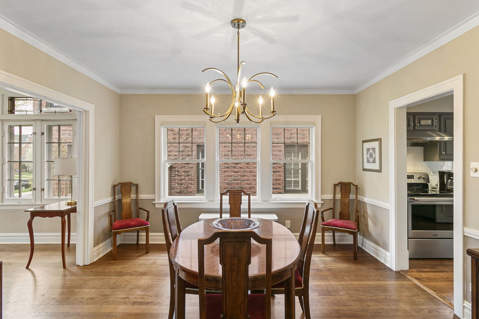 260 Bartram Road Riverside, IL 60546 - Photo 8 of 36 a view of a dining room with furniture window and wooden floor