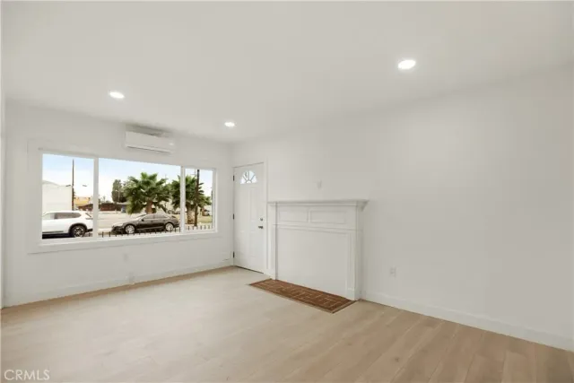 a kitchen with white cabinets