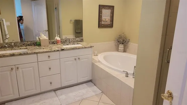 a view of a balcony with wooden floor