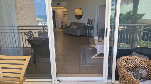 a bathroom with a granite countertop sink toilet and mirror