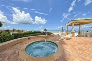 a kitchen with stainless steel appliances granite countertop a sink and a stove