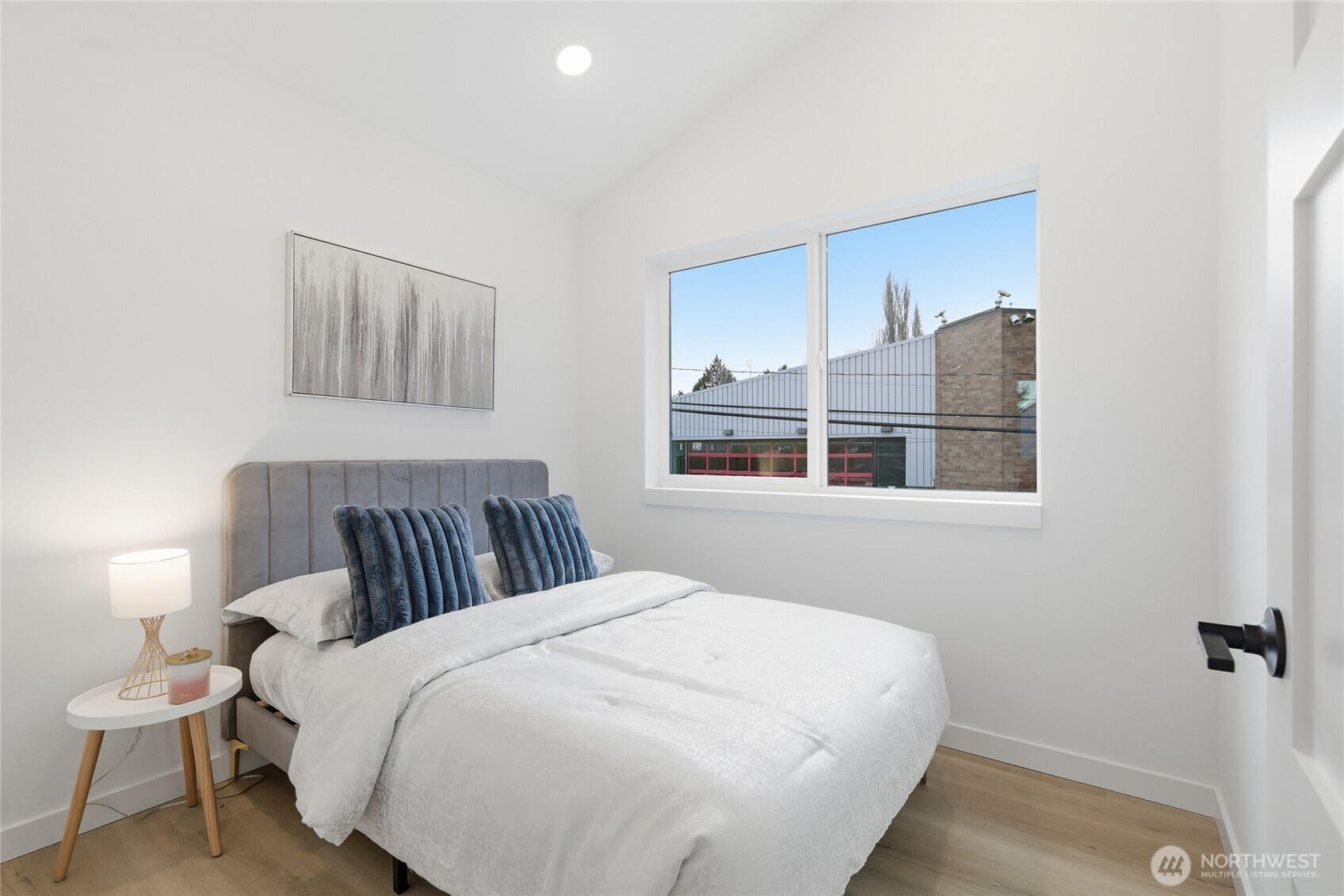 805 South Sullivan Street, Unit B Seattle, WA 98108 - Photo 16 of 20 a bedroom with a bed and window