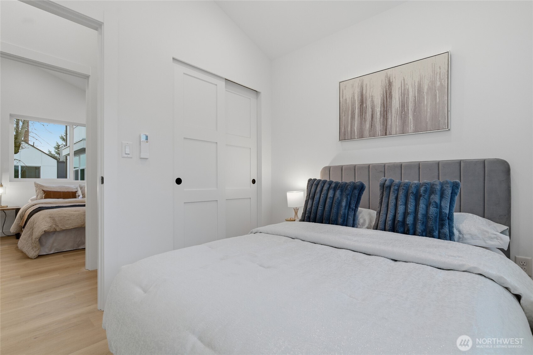 805 South Sullivan Street, Unit B Seattle, WA 98108 - Photo 17 of 20 a bedroom with a bed and a couch