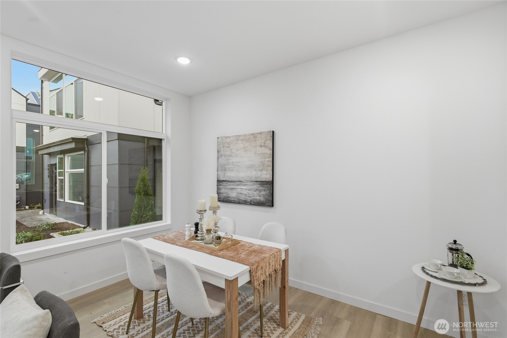 805 South Sullivan Street, Unit B Seattle, WA 98108 - Photo 9 of 20 a dining room with a table and chairs