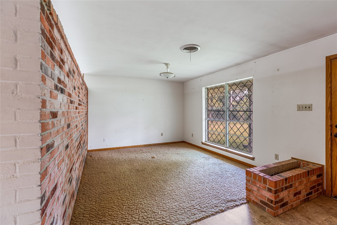 32302 Dobbin-Huffsmith Road Magnolia, TX 77354 - Photo 31 of 34 a living room with furniture and a window