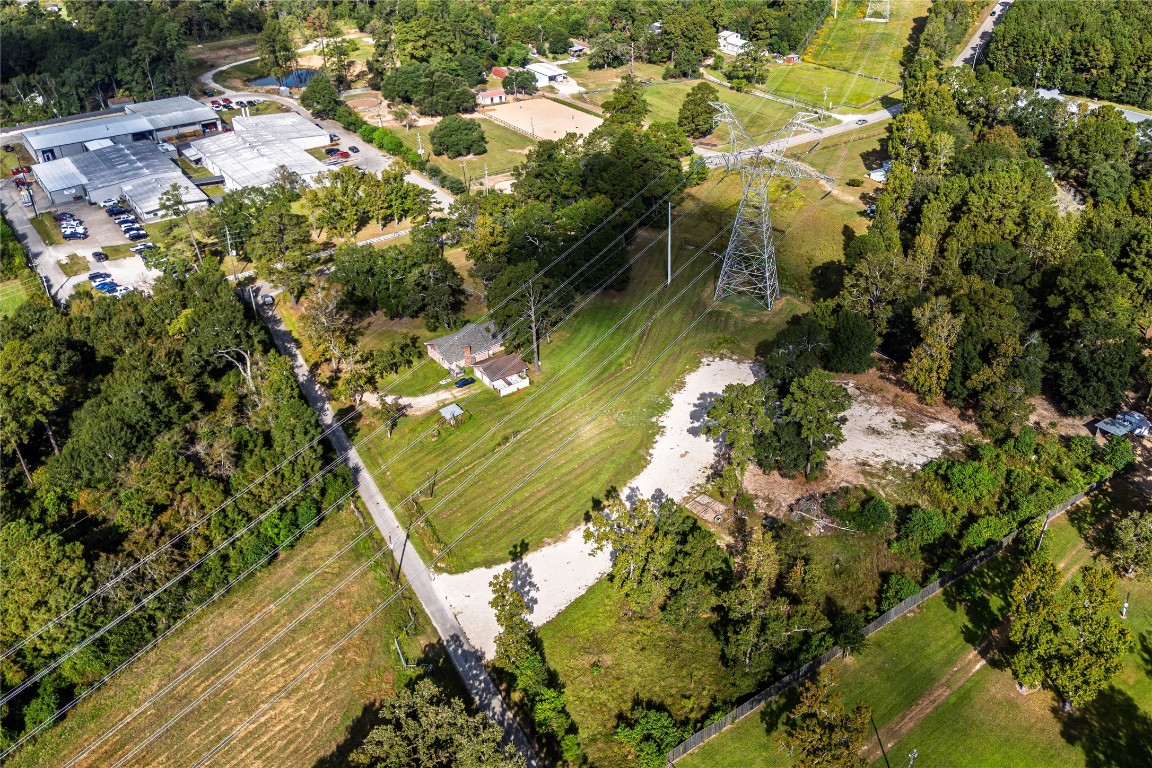 32302 Dobbin-Huffsmith Road Magnolia, TX 77354 - Photo 5 of 34 a view of a garden