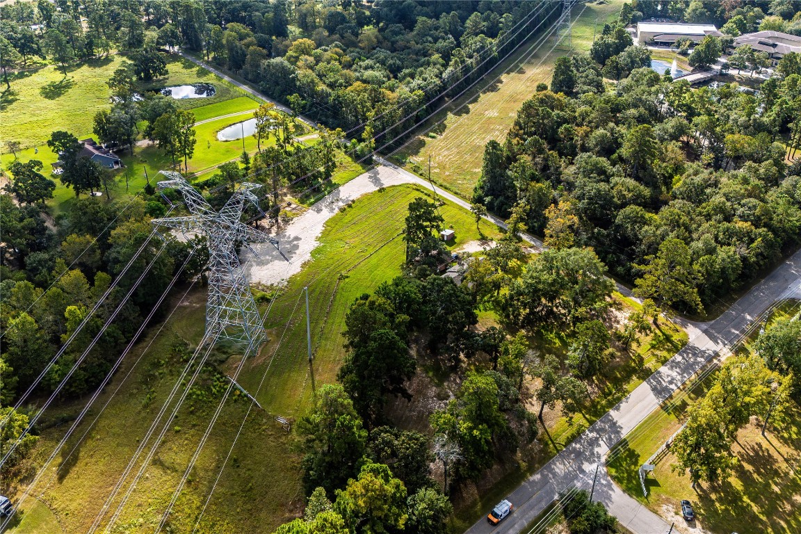 32302 Dobbin-Huffsmith Road Magnolia, TX 77354 - Photo 7 of 34 a view of a garden