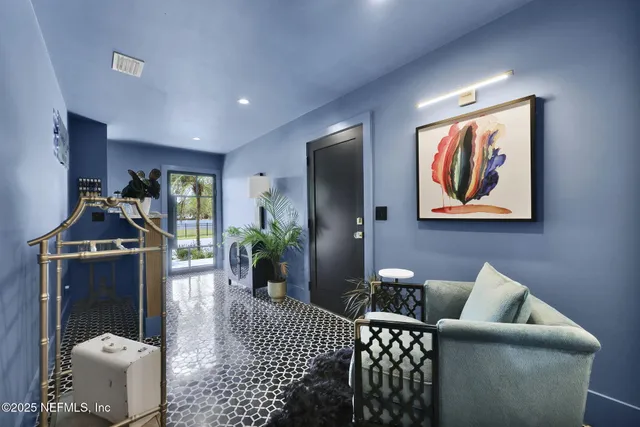 a utility room with sink dryer and washer