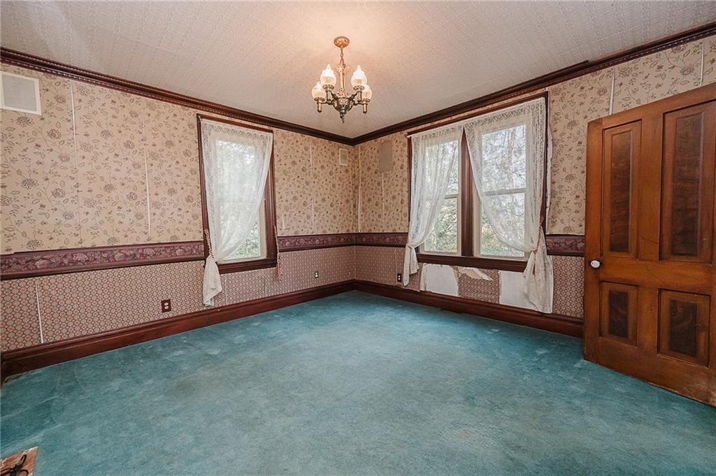 211 Old Mill Road Apollo, PA 15613 - Photo 18 of 42 a view of an empty room with window and hardwood