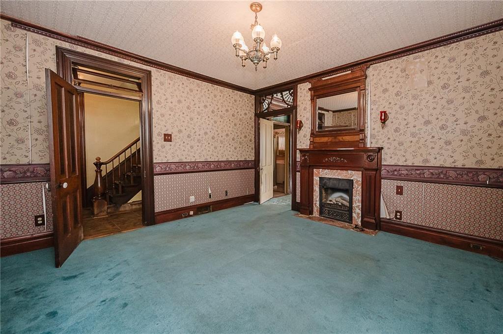 211 Old Mill Road Apollo, PA 15613 - Photo 20 of 42 a view of a livingroom with an empty space and a fireplace