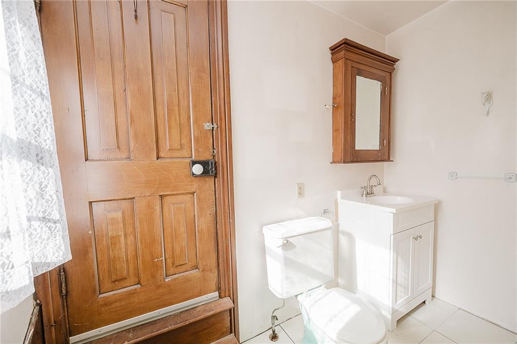 211 Old Mill Road Apollo, PA 15613 - Photo 22 of 42 a bathroom with a sink a mirror and a shower