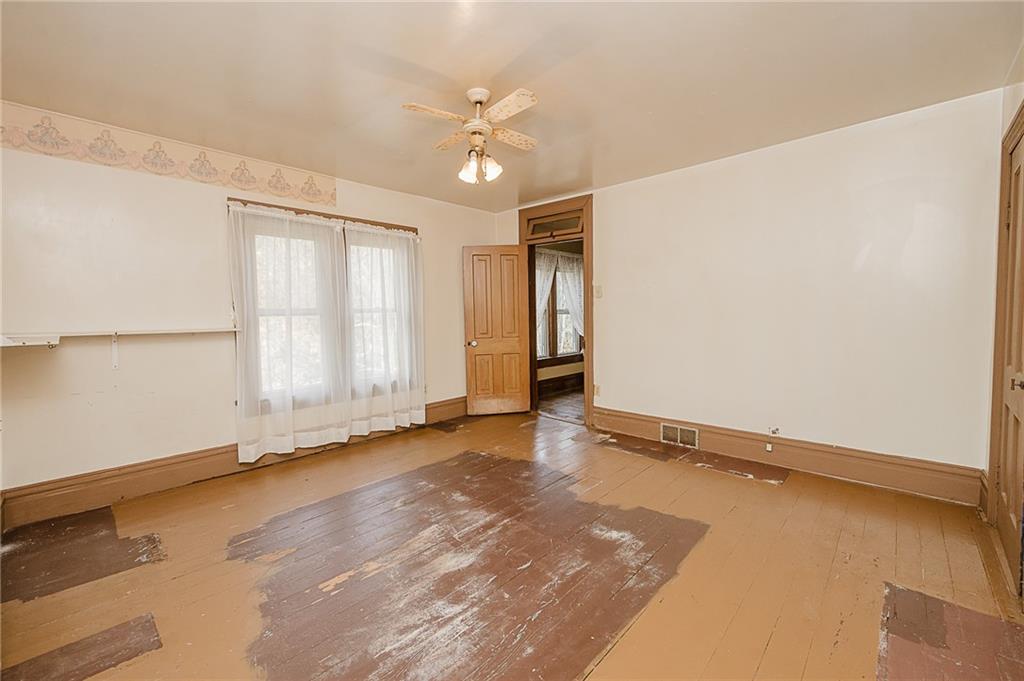 211 Old Mill Road Apollo, PA 15613 - Photo 28 of 42 wooden floor in an empty room with a window