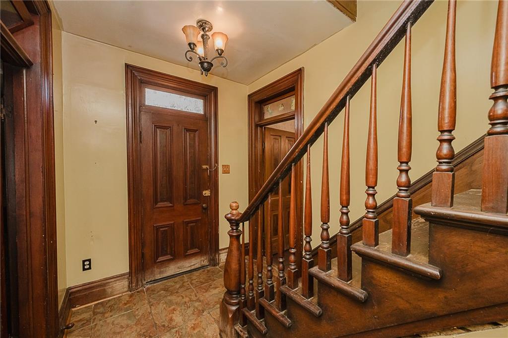 211 Old Mill Road Apollo, PA 15613 - Photo 3 of 42 a view of an entryway with wooden floor and stairs