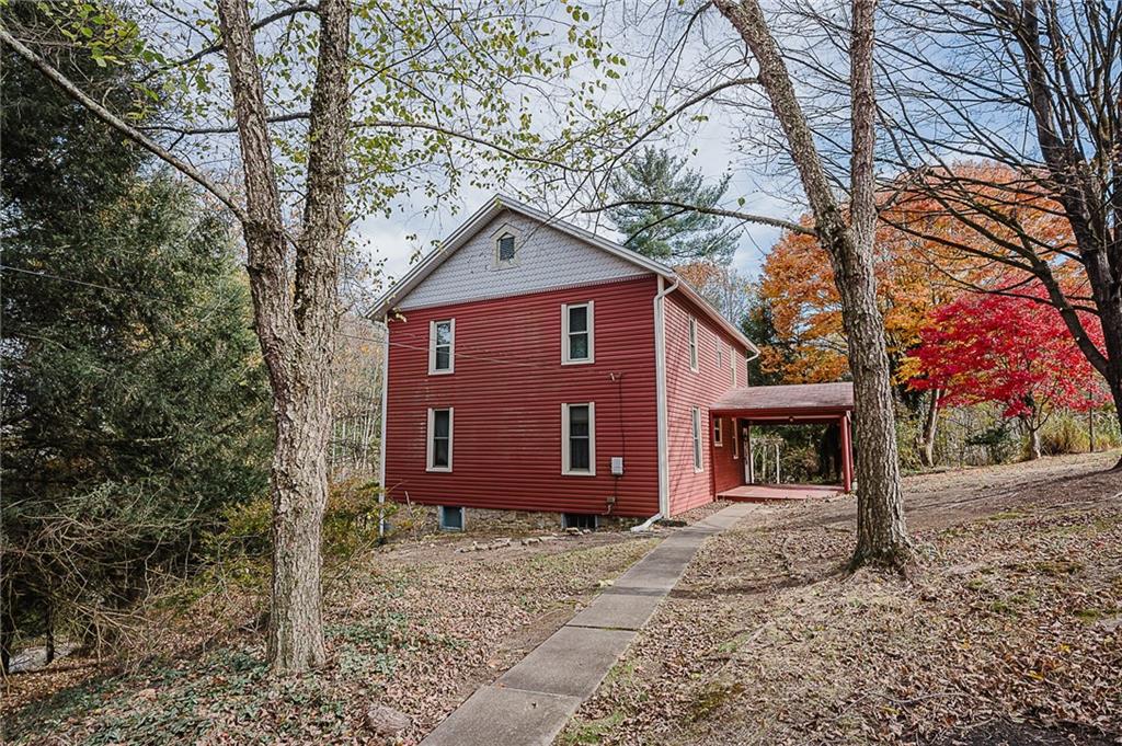 211 Old Mill Road Apollo, PA 15613 - Photo 35 of 42 a view of a barn house with a yard and large tree